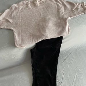 A lot of black pants and 4 tops